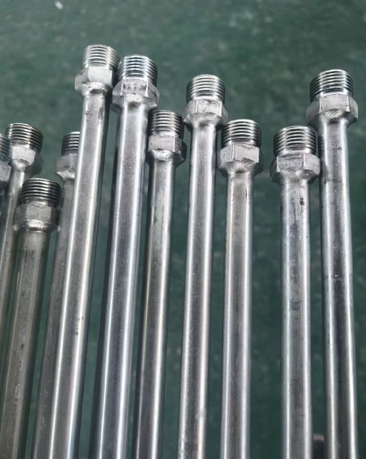 TIG welded threaded fittings on hydraulic tubes