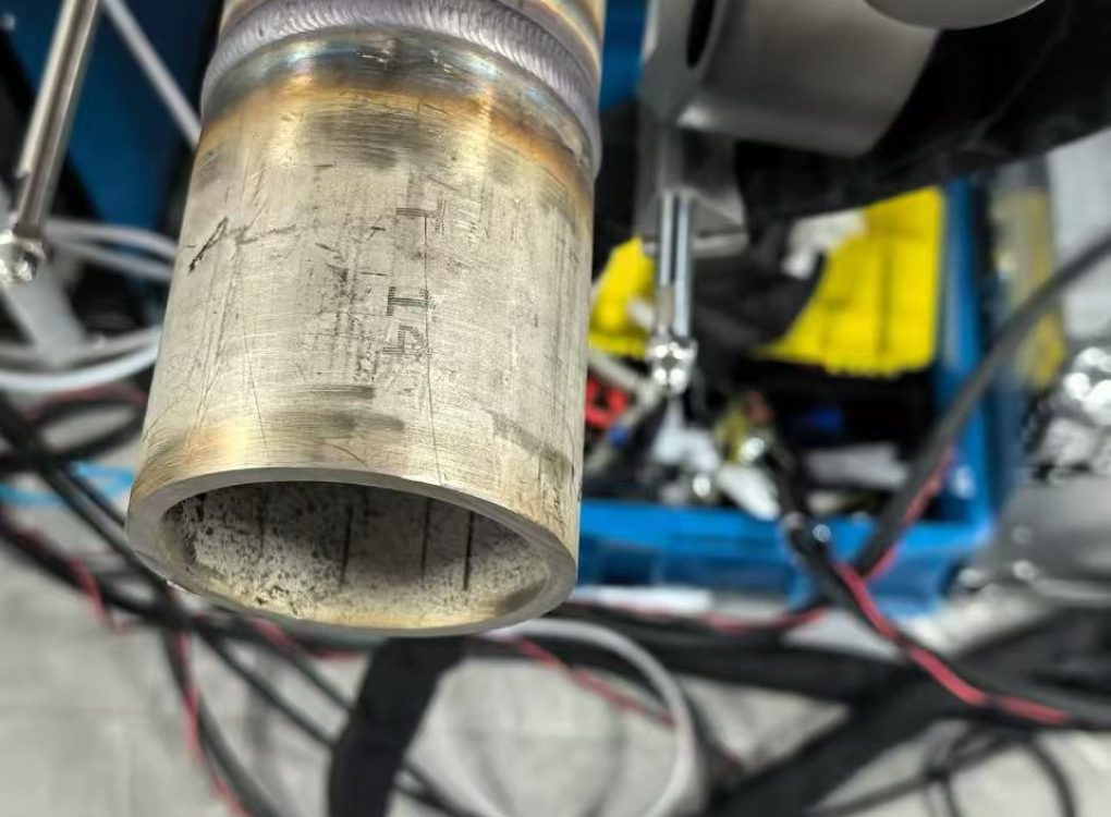 Open orbital TIG welded butt joint on a thick-wall pipe